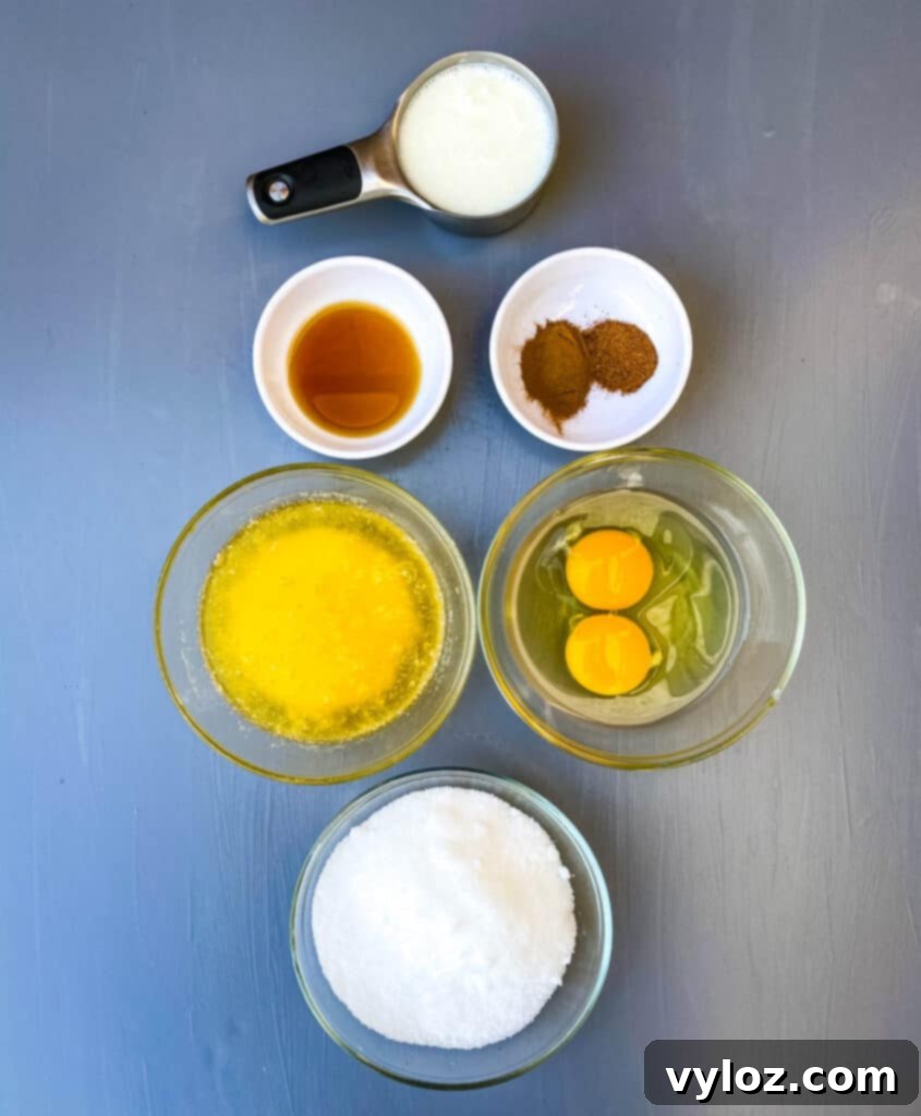 buttermilk, vanilla, cinnamon, melted butter, raw eggs, and sweetener in separate glass bowls