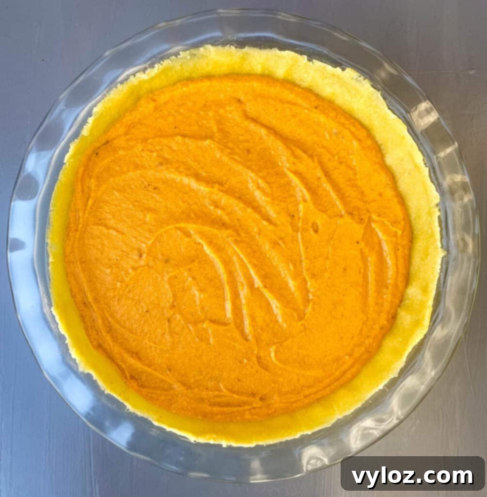 unbaked sweet potato pie on flat surface