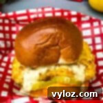 Crispy Air Fryer Fish Sandwich 11 air fryer fish sandwich on a bun with melted cheese and tartar sauce