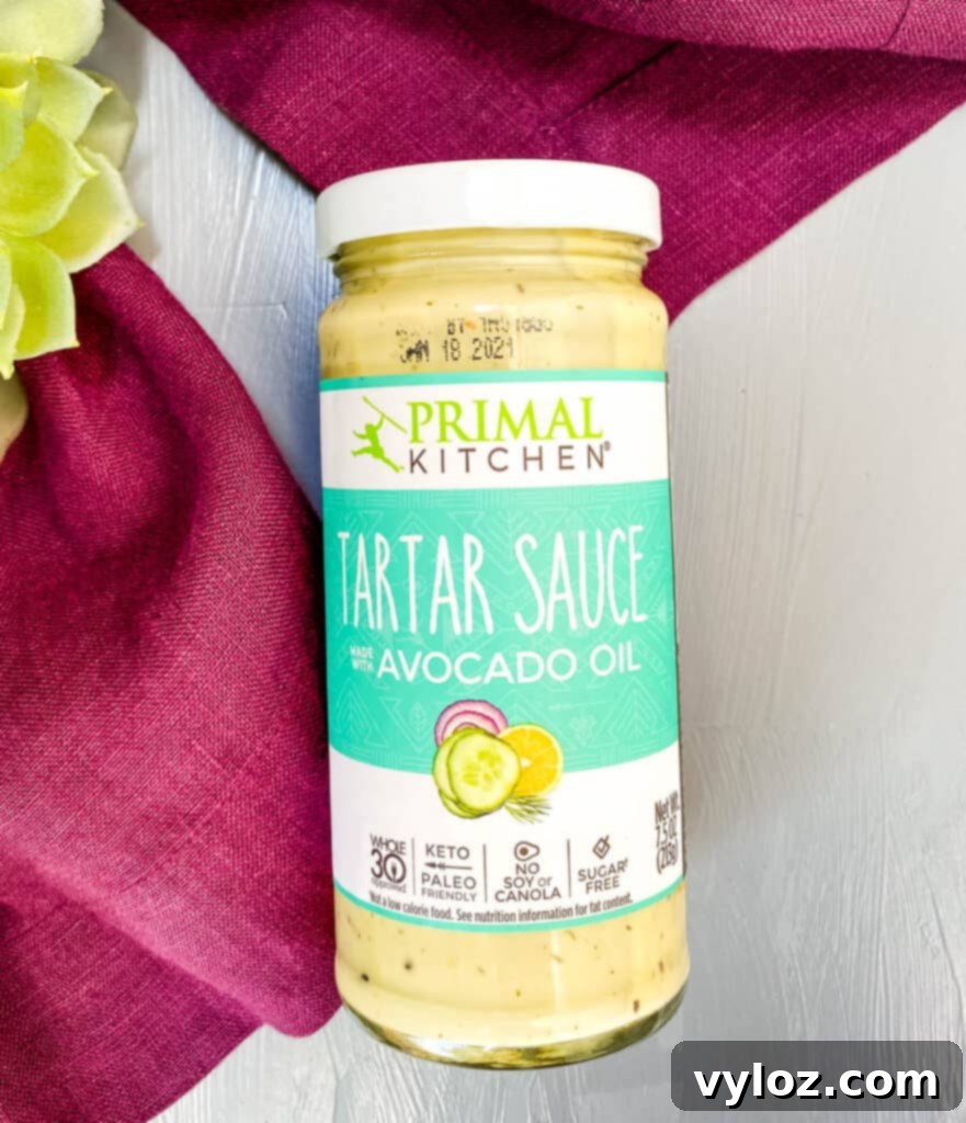 Crispy Air Fryer Fish Sandwich 3 Primal Kitchen tartar sauce in its container