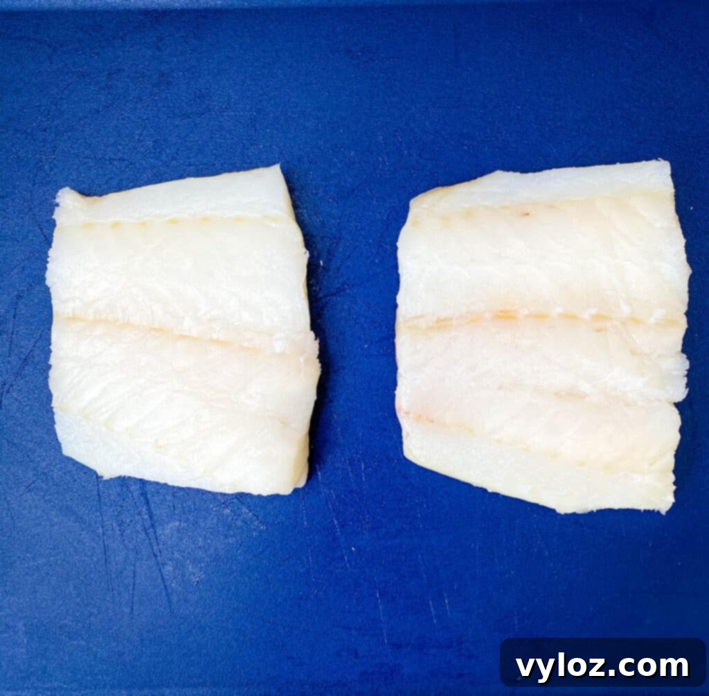 Crispy Air Fryer Fish Sandwich 4 Fresh white fish fillets ready for breading