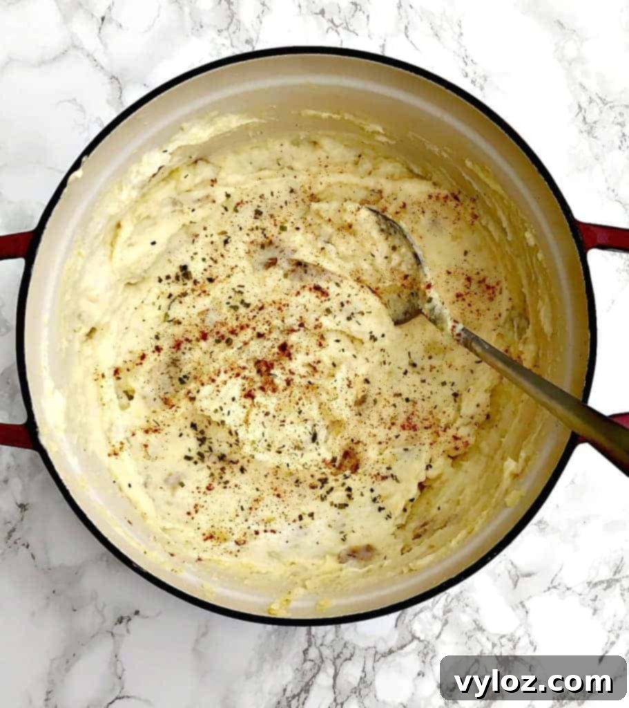 Rich and Creamy Dutch Oven Mashed Potatoes 3 Close-up of fluffy, healthy mashed potatoes in a Dutch oven