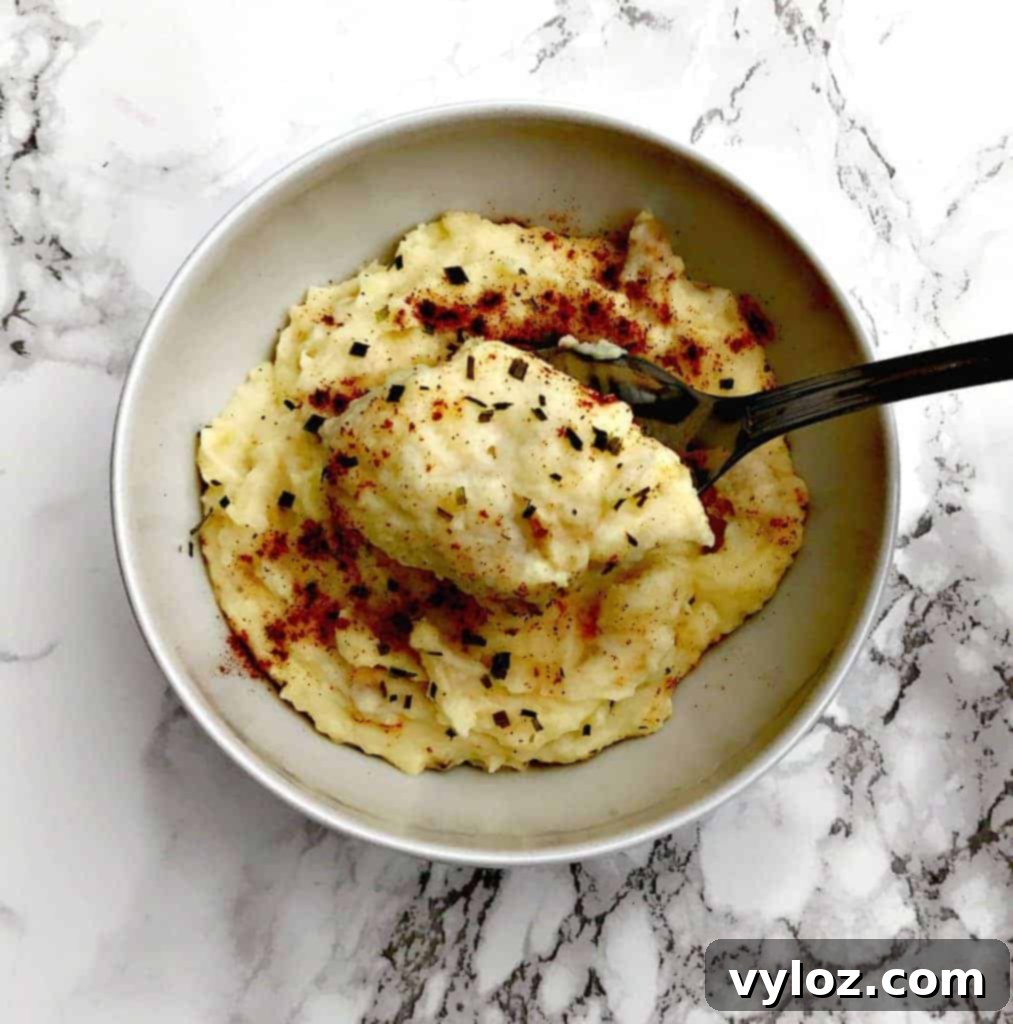 Rich and Creamy Dutch Oven Mashed Potatoes 8 Creamy mashed potatoes topped with fresh chives