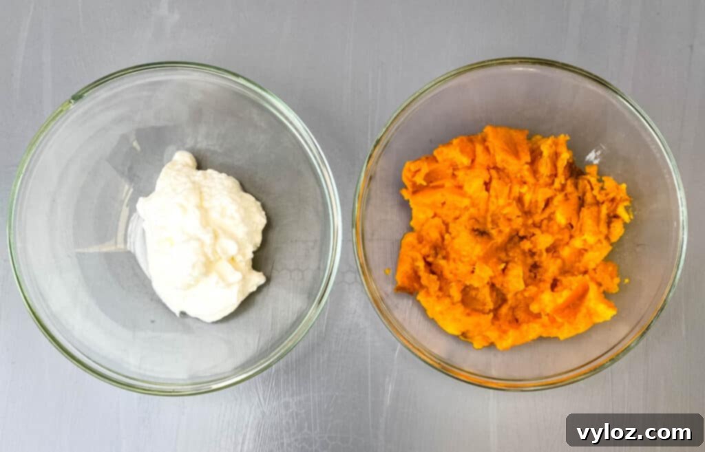 Deliciously Easy Sweet Potato Biscuits 3 Separate glass bowls containing creamy Greek yogurt and smooth mashed sweet potatoes, ready for baking.