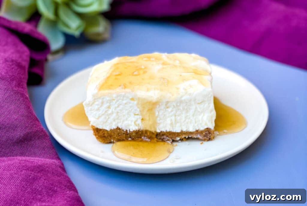 Keto low-carb salted caramel cheesecake bar on a white plate