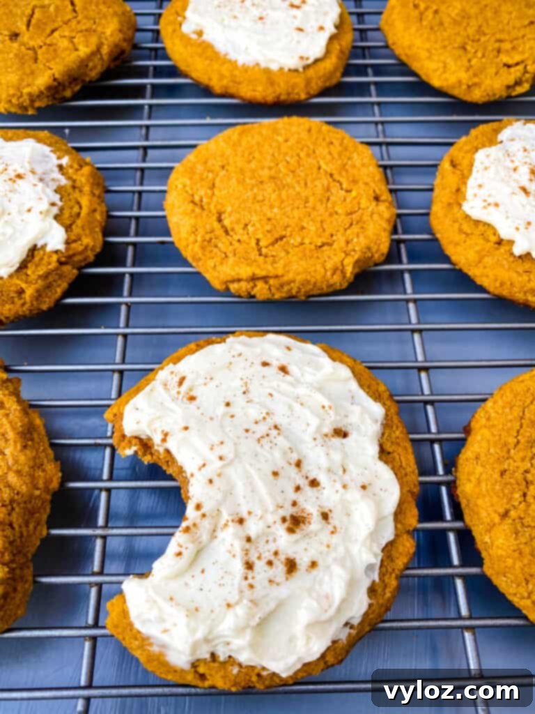 Guilt-Free Pumpkin Spice Cookies 14 keto pumpkin cookies with icing on a cooling rack