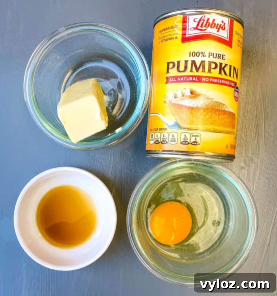 Guilt-Free Pumpkin Spice Cookies 3 butter, pumpkin, vanilla, and a raw egg in separate bowls