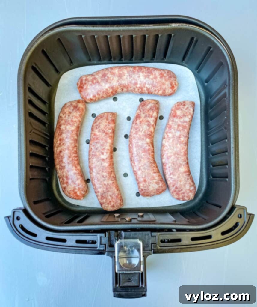 air fried bratwurst in an air fryer basket