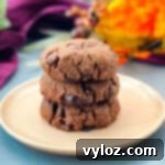 keto low carb double chocolate cookies on a pink plate with a purple napkin