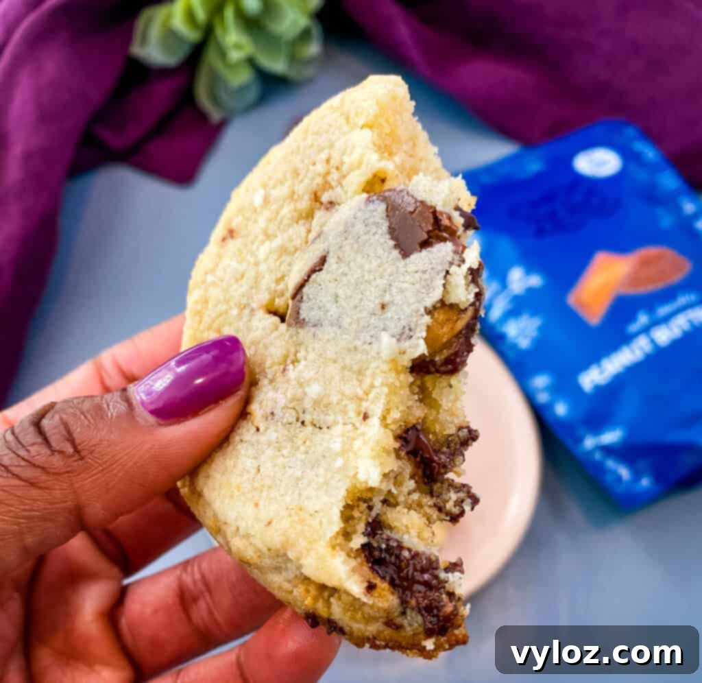 person holding keto low carb peanut butter cup