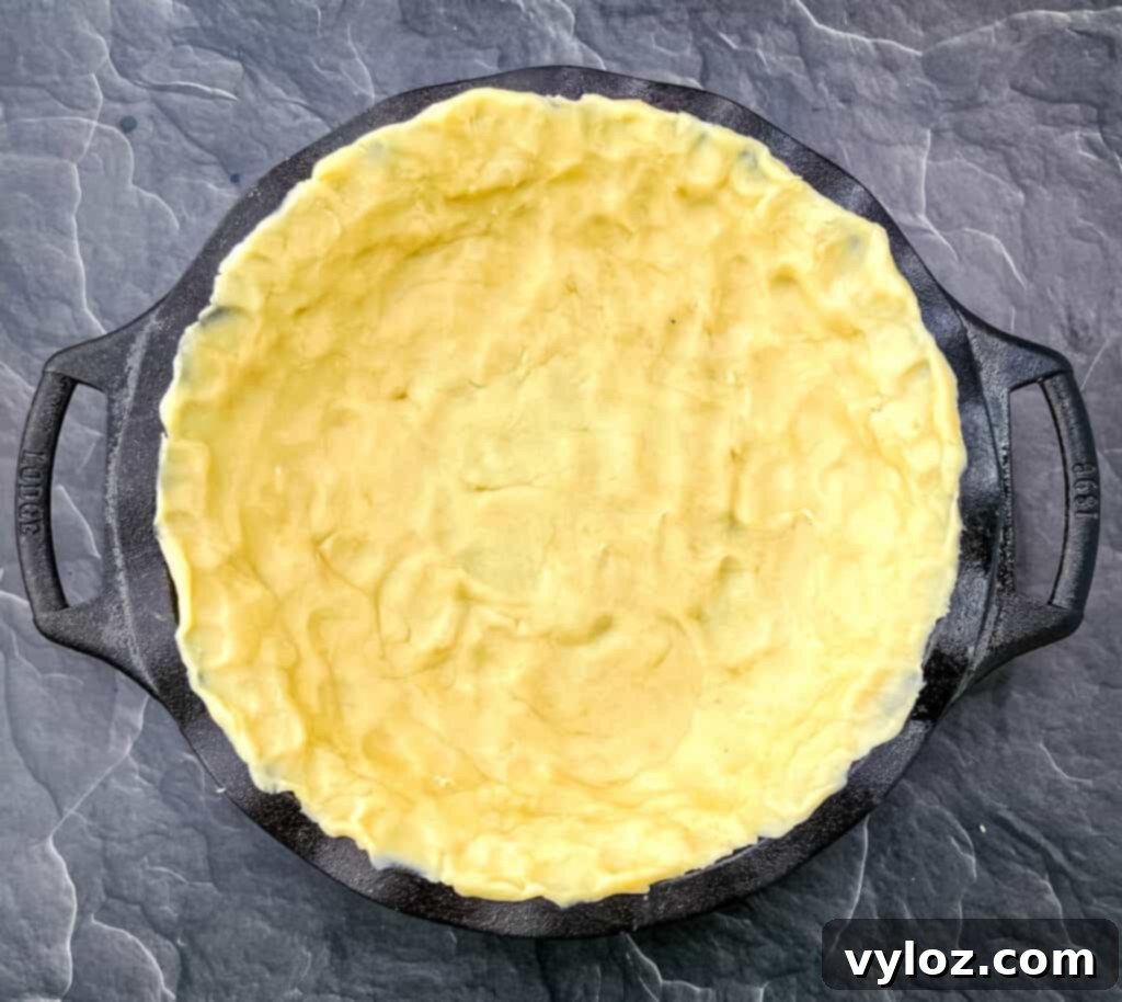 unbaked pie crust in a pie plate