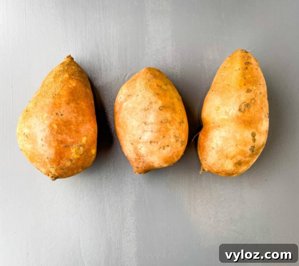 raw sweet potatoes on a flat surface