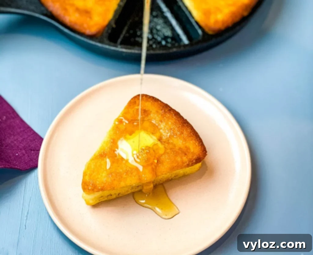 honey drizzled onto a slice of cornbread