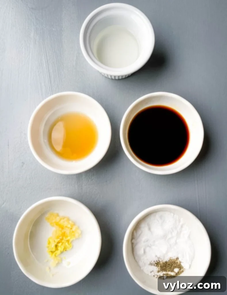 vinegar, garlic, ginger, soy sauce, sesame oil, and baking powder in separate bowls