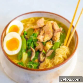 Instant Pot chicken ramen in a bowl with chopsticks