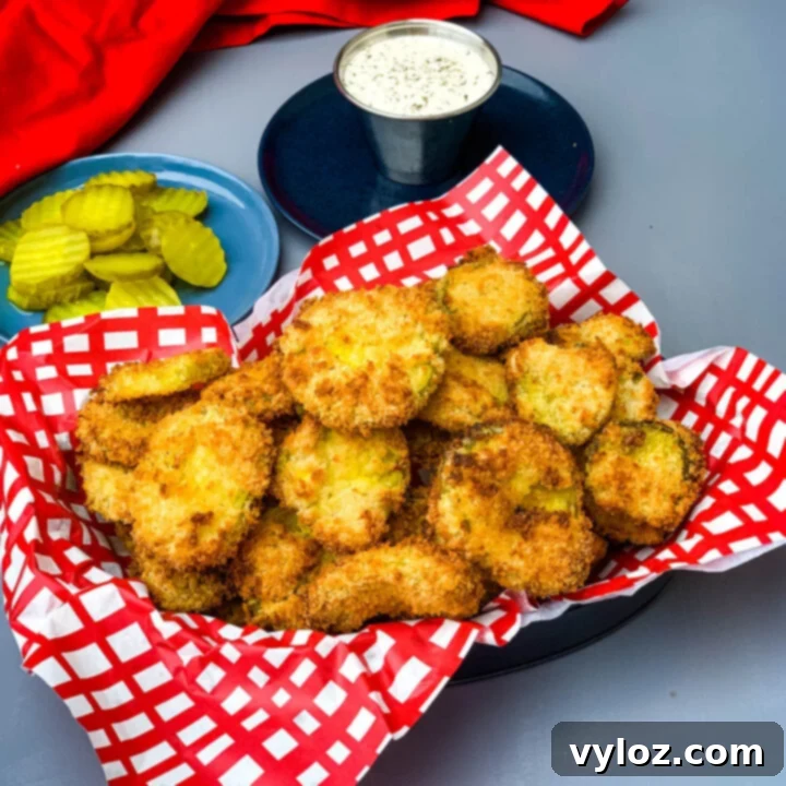 30 Quick and Delicious Air Fryer Appetizers 31 Air fryer crunchy fried pickles, breaded and golden, with ranch dip.