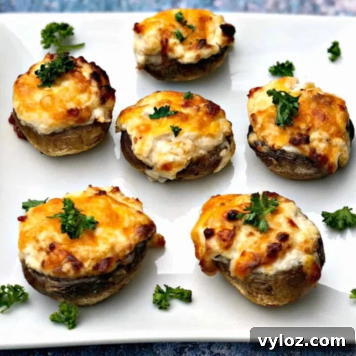 30 Quick and Delicious Air Fryer Appetizers 8 Air fried stuffed mushrooms filled with three types of cheese and garlic.
