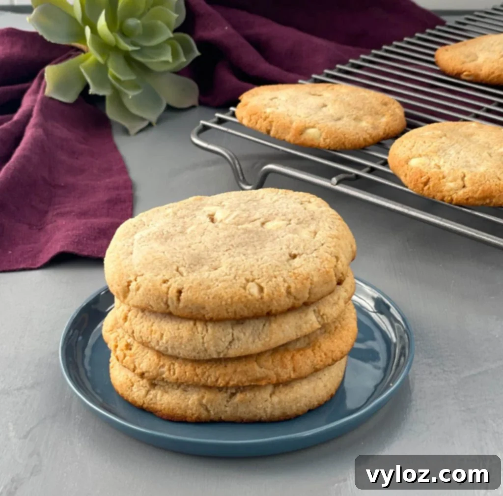 keto macadamia nut cookies stacked on a plate