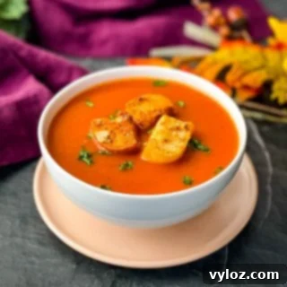 Instant Pot tomato soup in a white bowl
