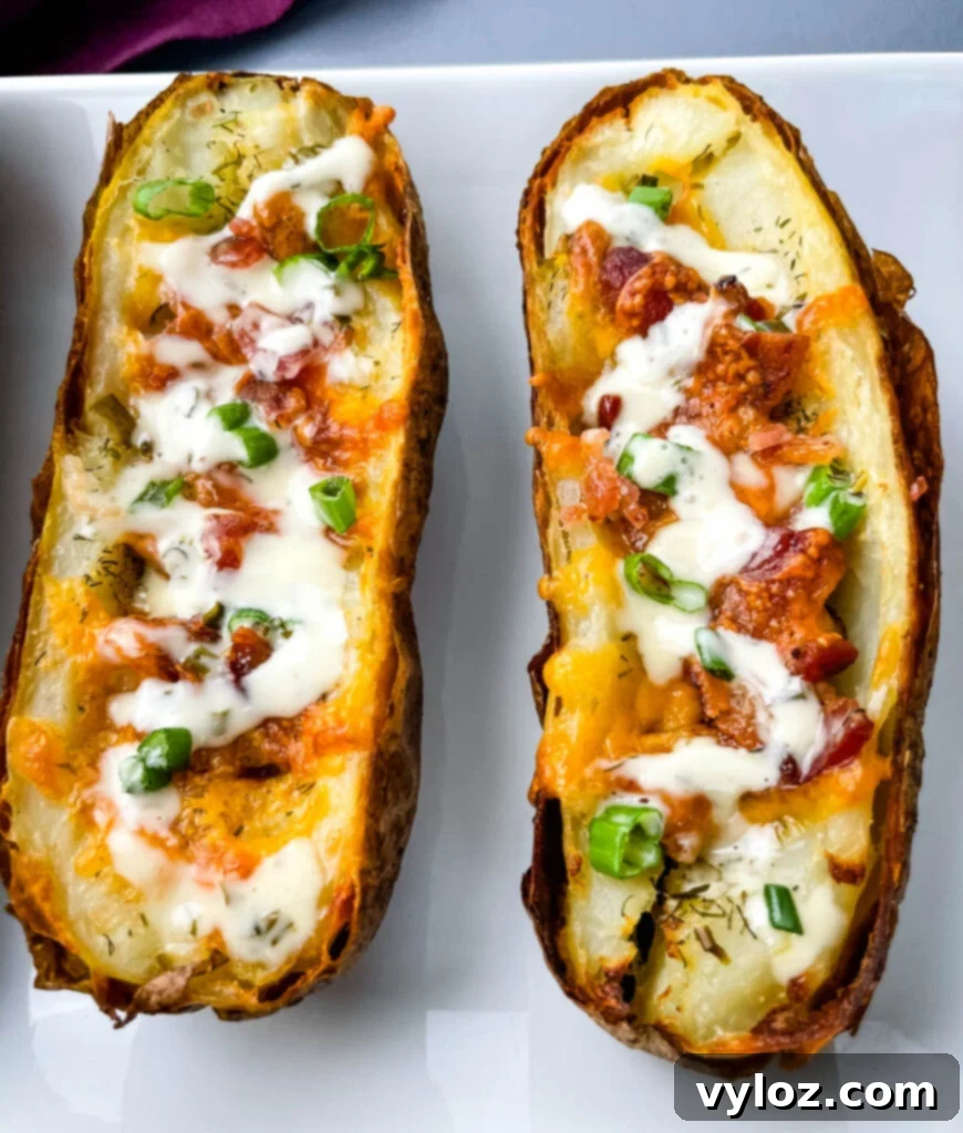 Variety of air fryer potato dishes on a wooden table