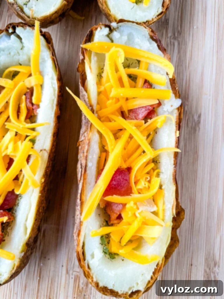 Close-up of potato skins with melted cheese and bacon