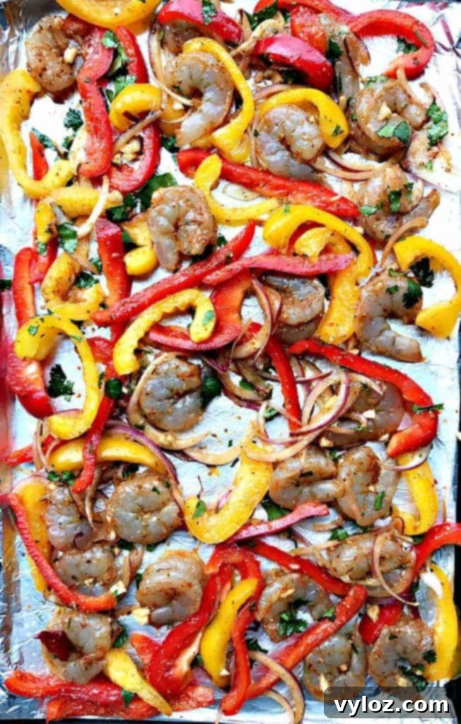 Effortless 20-Minute Low-Carb Sheet Pan Shrimp Fajitas 4 Freshly cooked 20-Minute Low-Carb One Sheet Pan Shrimp Fajitas on a sheet pan