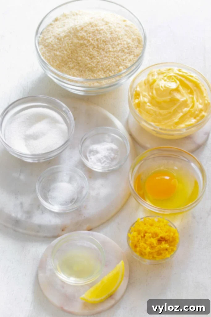 Zesty Sugar-Free Lemon Delights 3 almond flour, butter, sweetener, lemon zest, lemon juice, baking soda, and salt in separate bowls, ready for baking