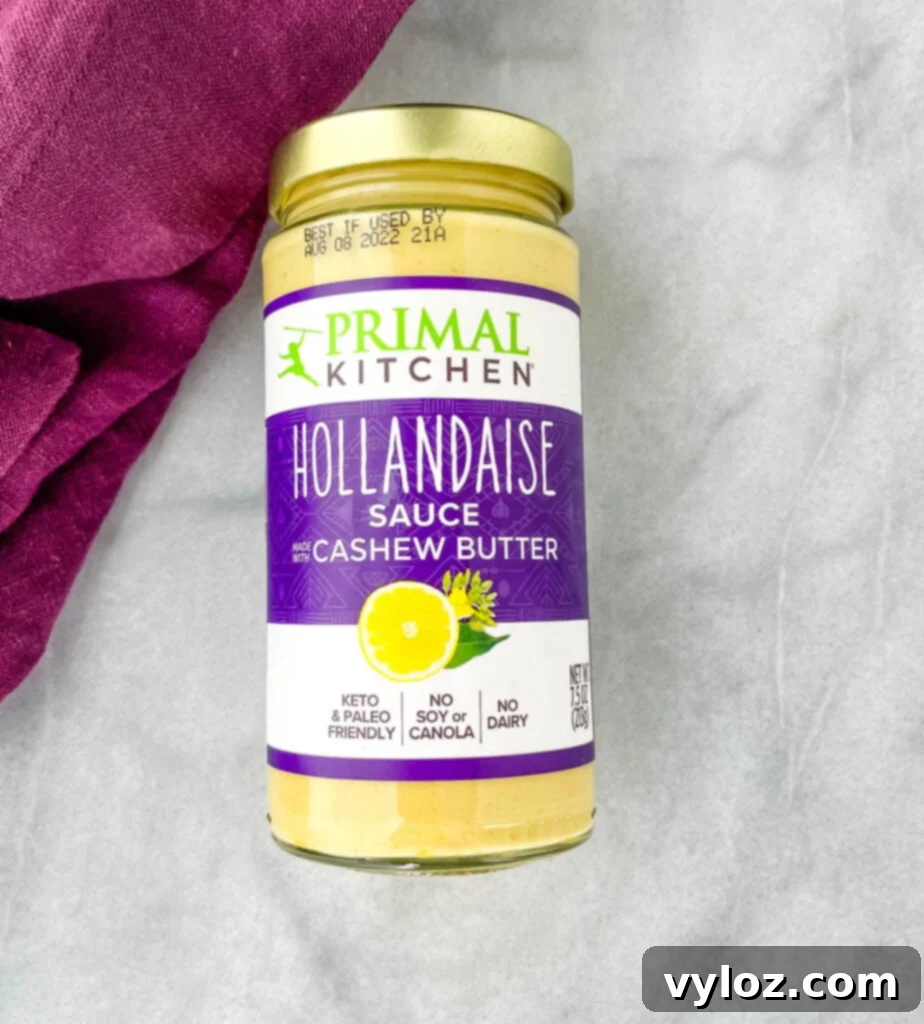 Primal Kitchen hollandaise sauce in a jar, showcasing its creamy texture