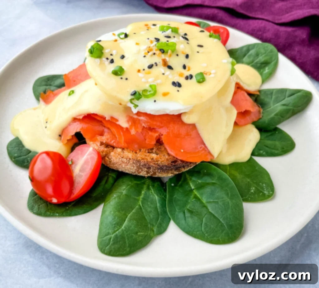 Multiple servings of smoked salmon eggs Benedict artfully arranged on a serving platter