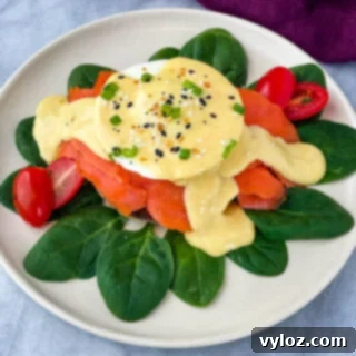 Smoked Salmon Eggs Benedict on a bed of spinach