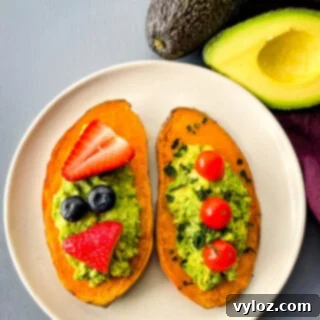sweet potato avocado toast on a plate with fresh fruit