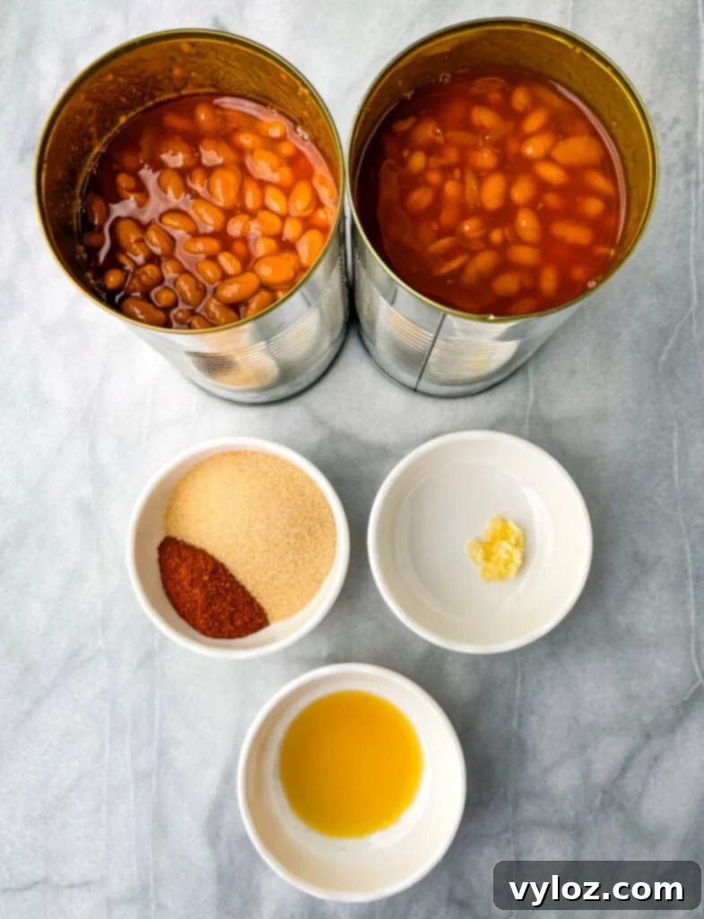 canned beans, chili powder, brown sugar, garlic, and liquid smoke in separate bowls