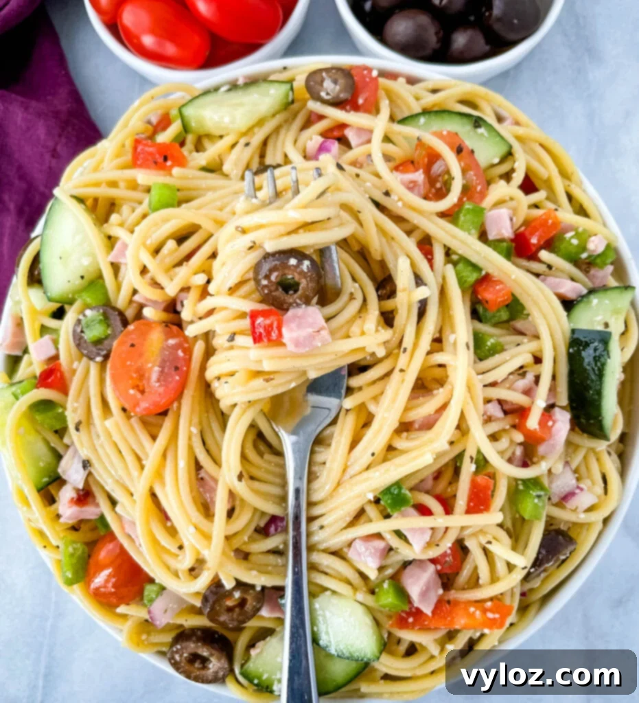 a forkful of spaghetti salad