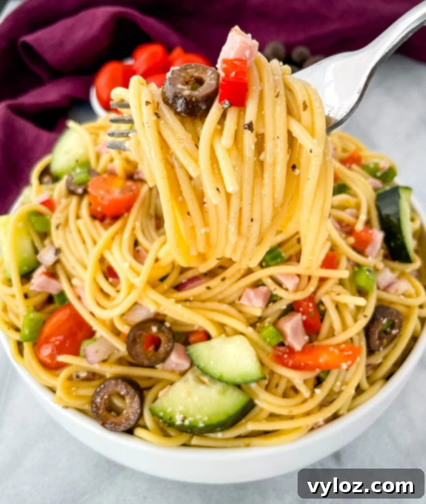 a forkful of spaghetti salad