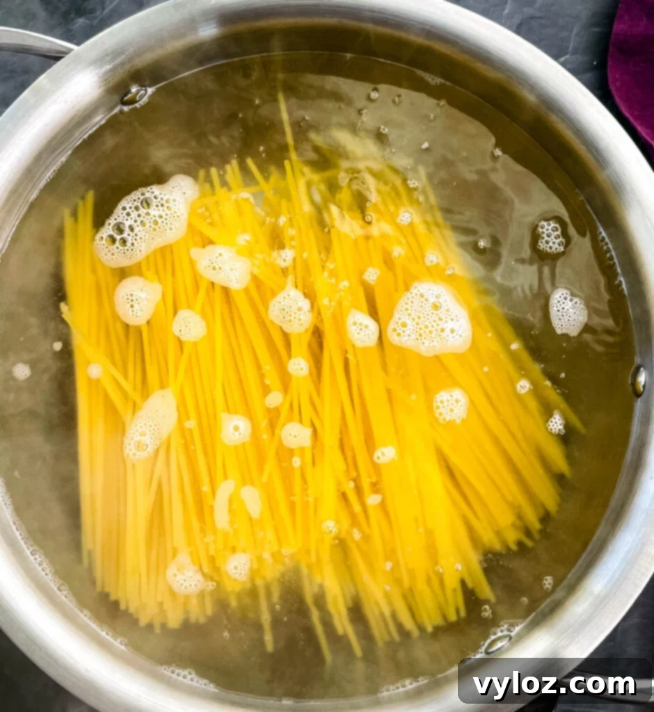 spaghetti boiling in a pot