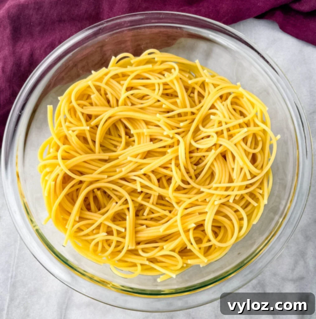 cooked spaghetti pasta in a glass bowl