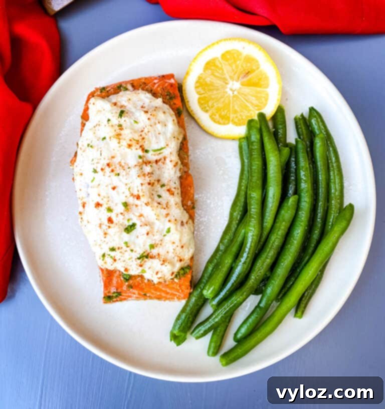 Delicious crab and parmesan stuffed salmon, perfectly baked and ready to serve.