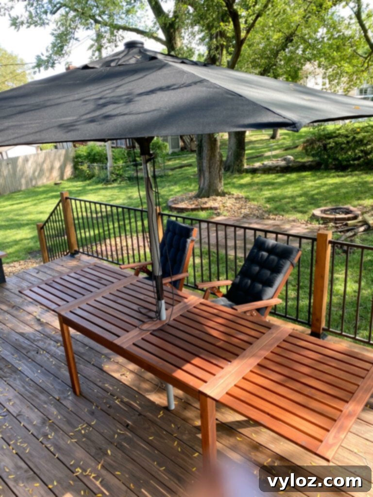 A beautifully arranged outdoor patio with comfortable furniture, inviting relaxation and outdoor living in the new home.