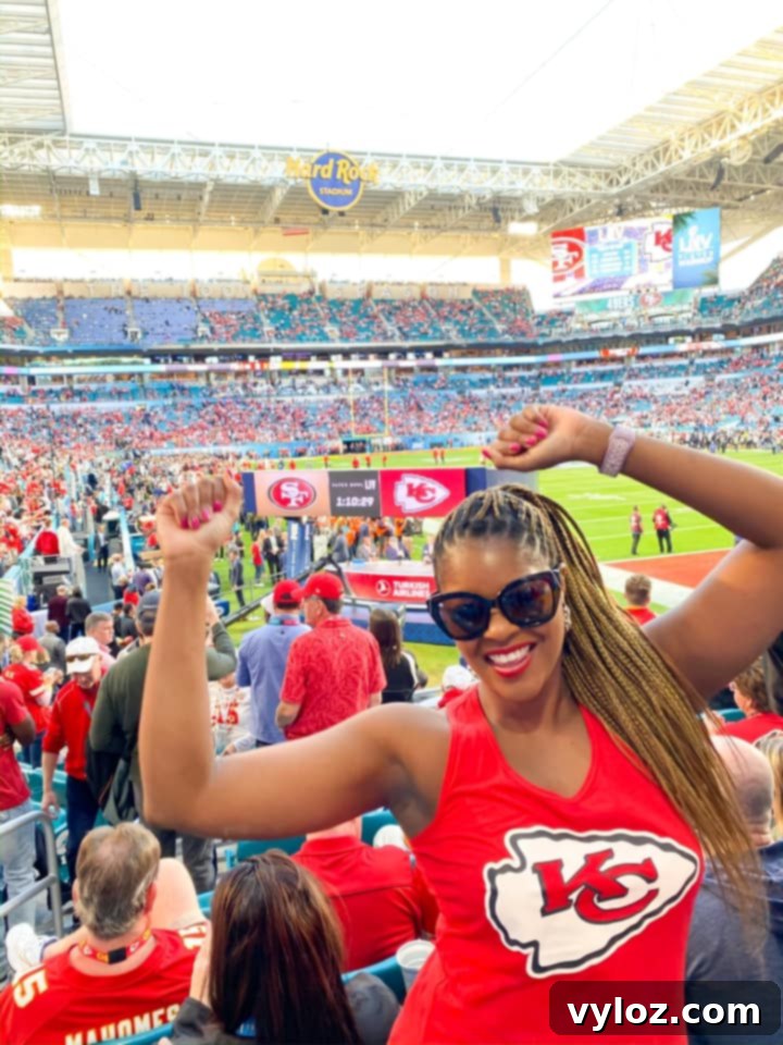 A person enjoys the electric atmosphere of a Super Bowl crowd, capturing a moment of pre-pandemic joy and excitement.