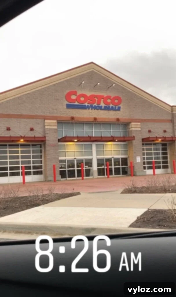 The exterior of a bustling Costco warehouse, a symbol of consumer behavior during the early days of the pandemic.