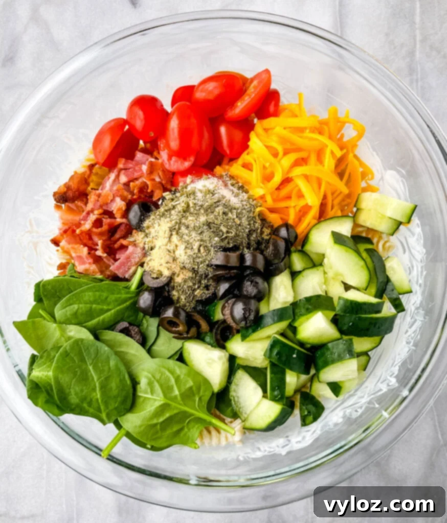 bacon ranch pasta salad in a glass bowl