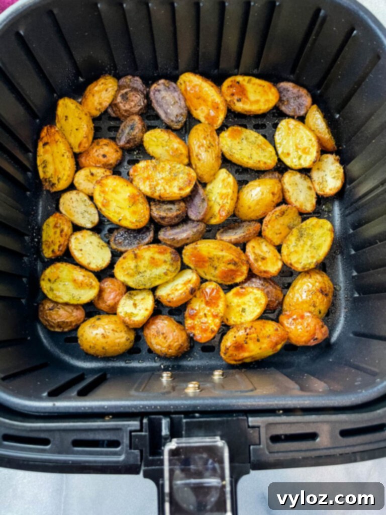 Crispy Ranch Roasted Potatoes 9 Perfectly roasted potatoes with ranch seasoning cooking in an air fryer