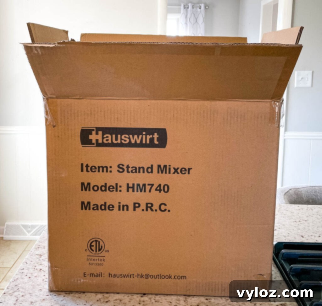 Hauswirt stand mixer components neatly packaged in its box, ready for setup