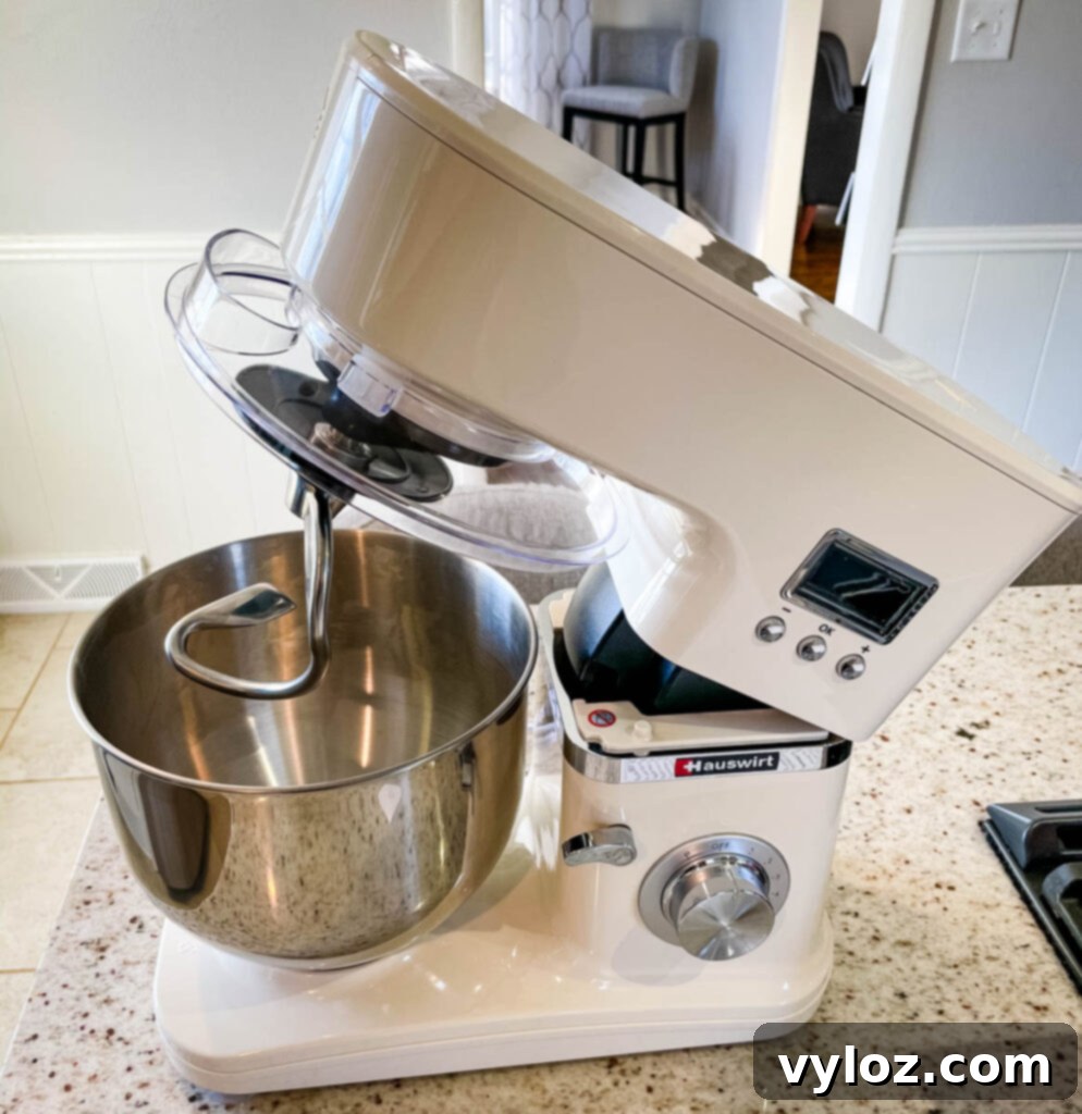 Hauswirt stand mixer expertly kneading dough in its stainless steel bowl on a countertop