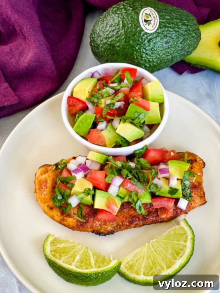 Vibrant Chicken Avocado Salsa 2 cooked chicken and avocado salsa on a plate