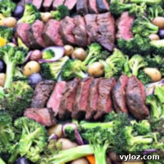 One-Pan Steak and Veggies Meal Prep 12 overview of baking pan with steak and veggies