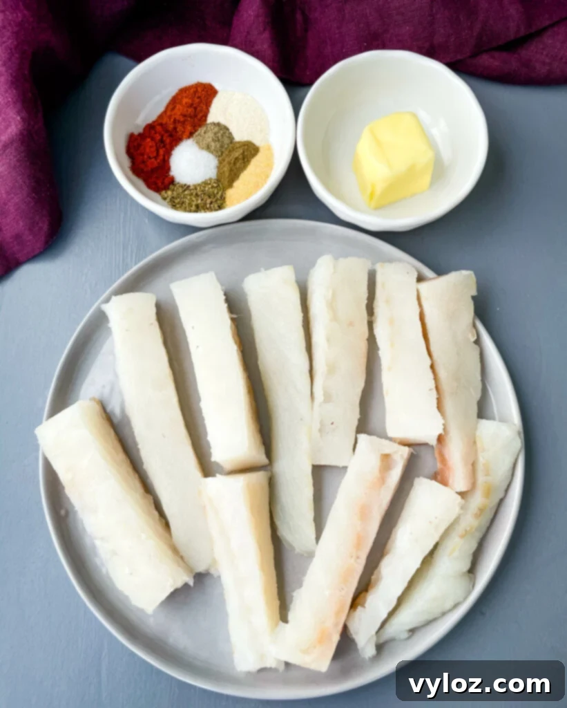 sliced, raw cod fish and blackened seasoning