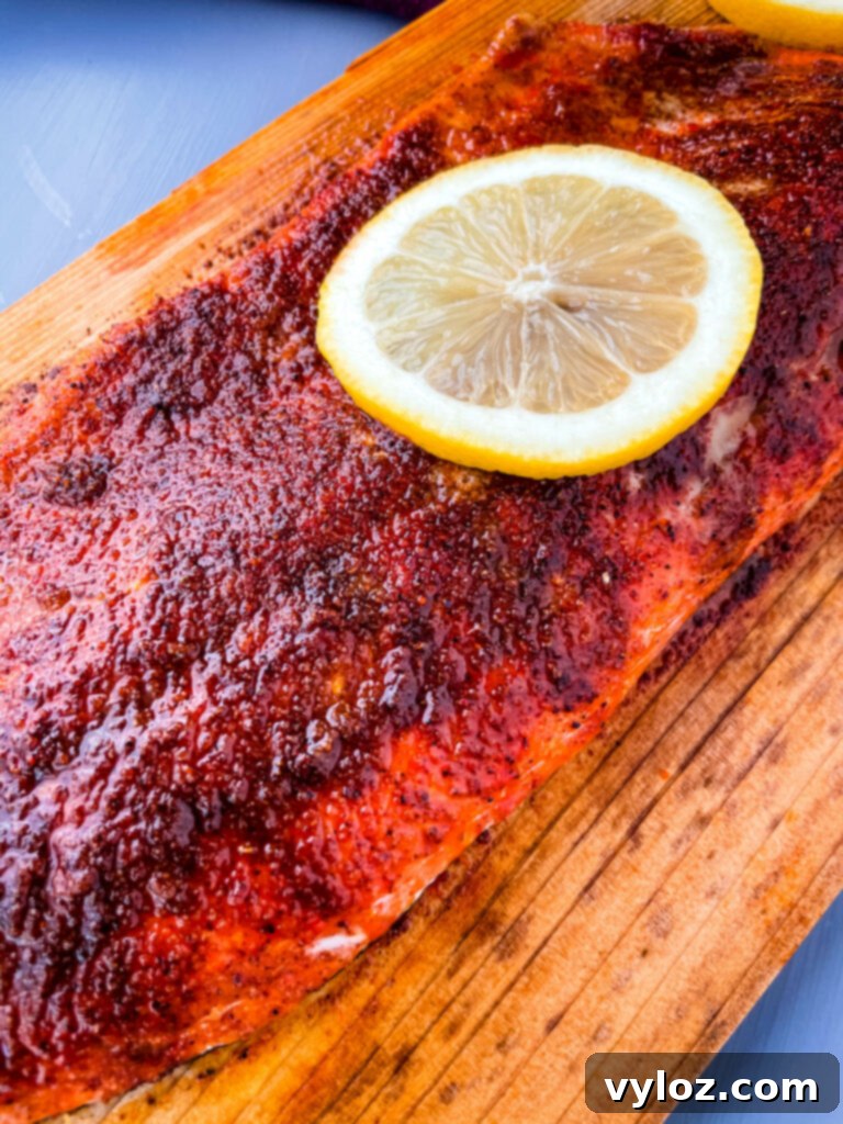 grilled salmon on a cedar plank with lemon