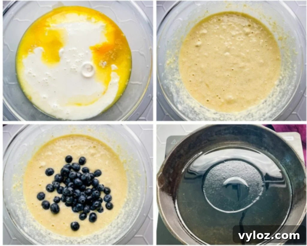 blueberry cornbread batter in a glass bowl