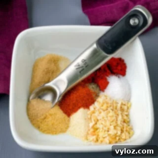 Secret Burger Spice 5 homemade Burger seasoning and rub in a white bowl